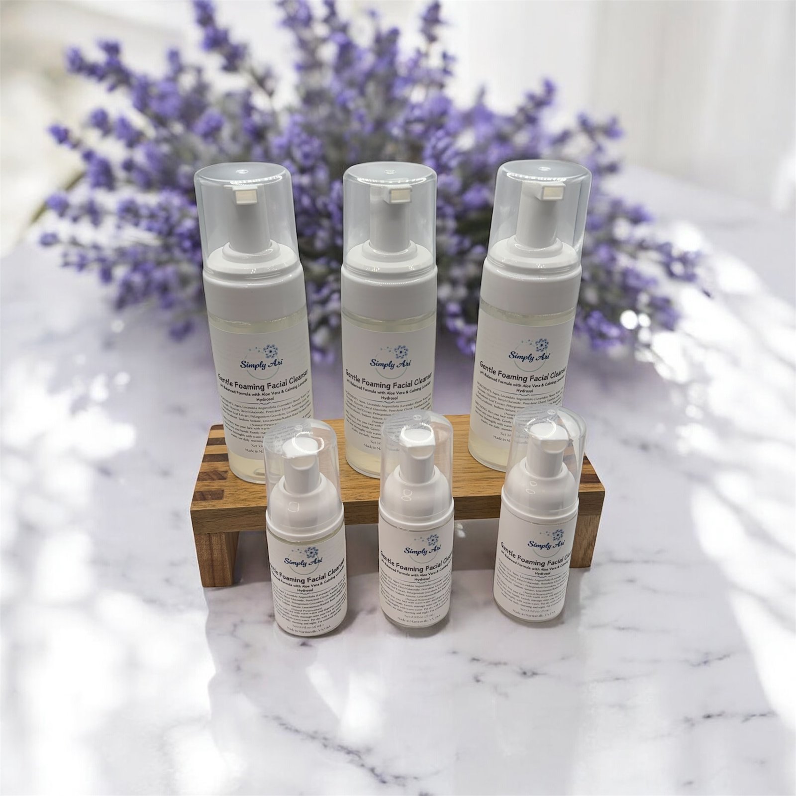 Simply Ari Gentle Foaming Facial Cleanser in full-size and smaller-size bottles with lavender